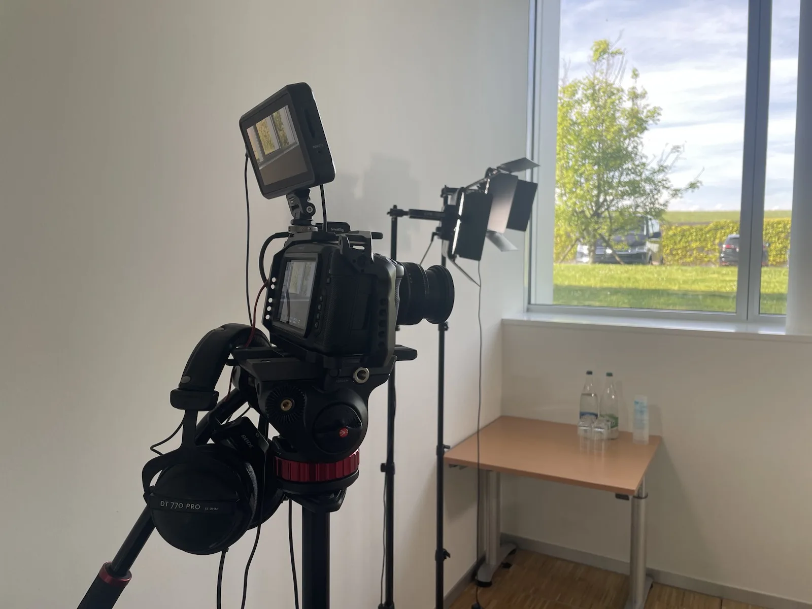 Camera prepared for photo and video work in a business setting.